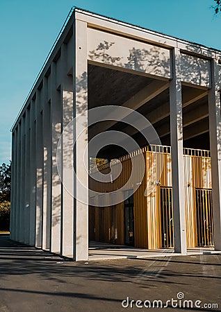 Modern and premium gray cubic building and clear blue sky Stock Photo