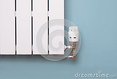 Modern radiator with TRV thermostatic radiator valve Stock Photo