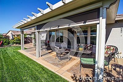 Modern Rear Yard Patio With Furniture Stock Photo