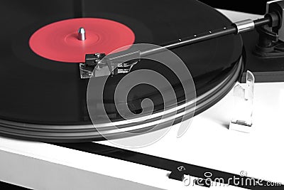 Modern record player with vinyl record closeup Stock Photo