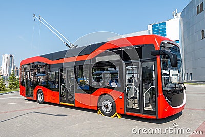 Modern trackless trolley at the trolleybus station Stock Photo