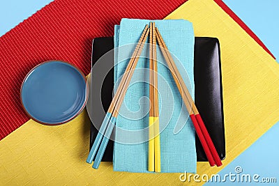 Modern red, yellow and blue Japanese Oriental Table Place Setting Stock Photo
