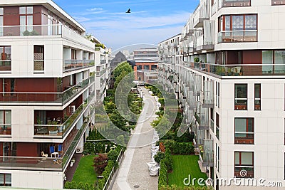 Modern residential apartment with flat building exterior with outdoor facilities Stock Photo