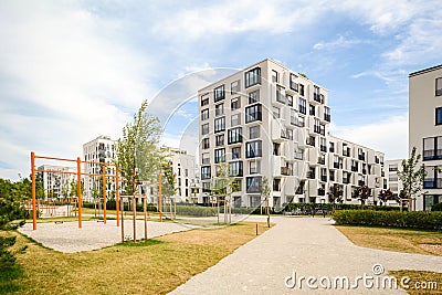 Modern residential buildings with outdoor facilities and children's playground, Facade of new apartment house Stock Photo