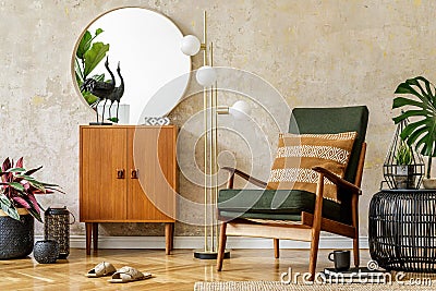 Modern retro composition of living room interior with vintage armchair, lamp, commode, tropical leaf, plant, decoration. Stock Photo