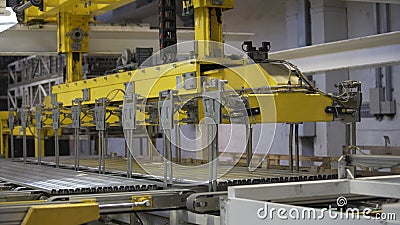 Modern robotic Aluminium extrusion production line factory warehouse. Plastic windows manufacture. Stock Photo
