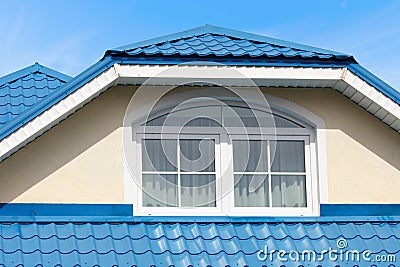 Modern roof blue metal roofing and skylight Stock Photo