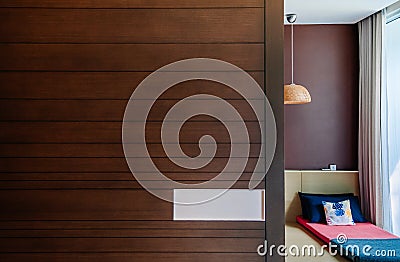 Modern room with colourful Asian futon and Ceiling lamp Editorial Stock Photo