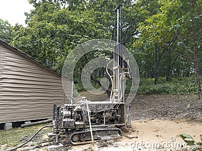 Modern rotary drill rigs bore water well Stock Photo