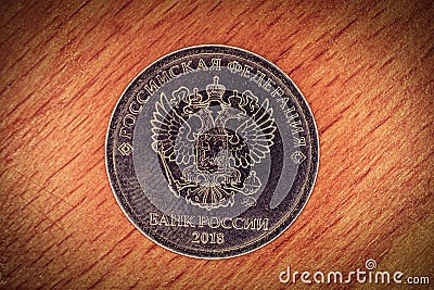 Modern russian coin revers with seal of Bank of Russia depicting twin headed eagle with heraldic signs Stock Photo