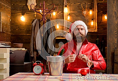 Modern Santa. Portrait of bearded man in santa costume. Stock Photo