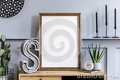 Modern scandinavian home interior with mock up poster frame, design wooden commode, big cement letter, cacti, plants, decoration. Stock Photo