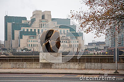 Modern sculpture against SIS Headquarters at Vauxhall Cross, London, England UK Editorial Stock Photo