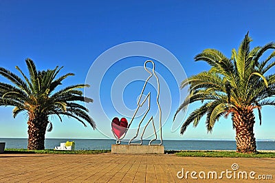 Modern sculpture with a heart on the beach Editorial Stock Photo