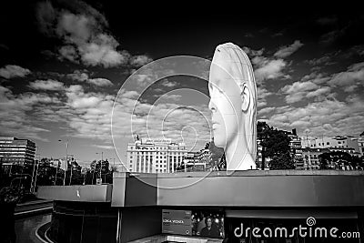 Modern sculpture titled Julia by Jaume Plensa Sune located at the Plaza de Colon in Madrid, Spain Editorial Stock Photo