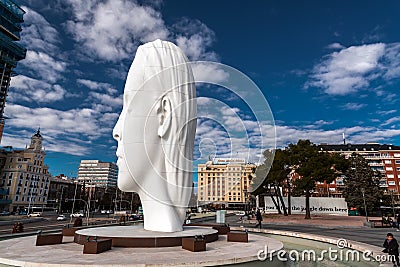 Modern sculpture titled Julia by Jaume Plensa Sune located at the Plaza de Colon in Madrid, Spain Editorial Stock Photo