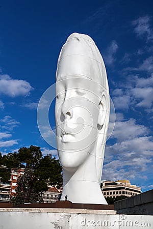 Modern sculpture titled Julia by Jaume Plensa Sune located at the Plaza de Colon in Madrid, Spain Editorial Stock Photo