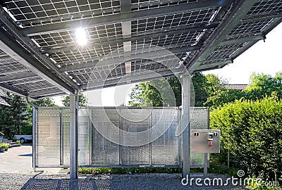 New carport with semi transparent photovoltaik moduls Stock Photo