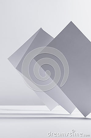 Modern simple geometric white grey abstract background with asymmetric standing papers with perspective, light and shadow, stripes Stock Photo