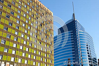 Modern Skyscraper and a building with an innovative system of green facade in Santiago Editorial Stock Photo