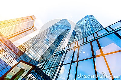 Modern skyscrapers in business district at sunset Stock Photo