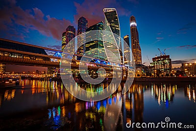 Modern skyscrapers of Moscow City on the Moskva River at night in summer, Russia Editorial Stock Photo