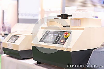 Modern smart & automatic Specimen mold mounting press device of laboratory for preparation sample before microstructure process Stock Photo