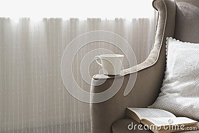 Modern sofa with a coffee cup Stock Photo