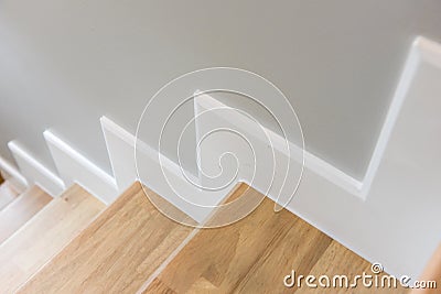 modern stair design with wooden tread and white riser Stock Photo
