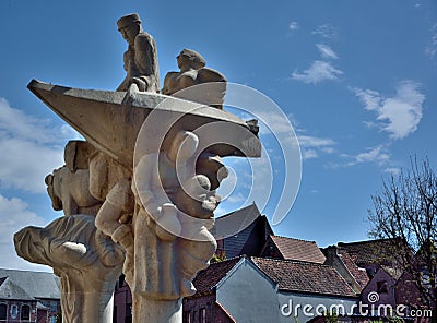 Modern statue with various ancient professions Editorial Stock Photo