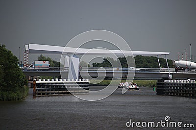 Modern steel draw bridge over river Hollandsche IJssel in the Netherlands Editorial Stock Photo