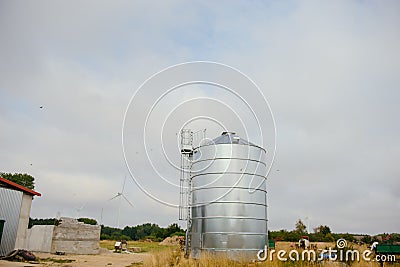 Modern steel grain silo agriculture Stock Photo