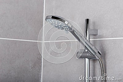 Modern style steel circular shower head in the bathroom Stock Photo