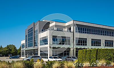 Modern suburban low rise office building. Architectural Exterior of Modern Low Rise Commerical Office Building Facade Stock Photo