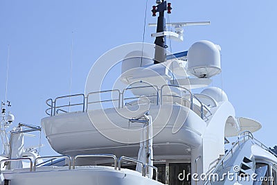 Modern super yacht top deck against blue sky . Stock Photo