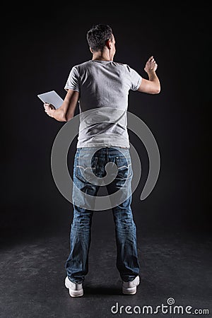 Confident smart programmer working on a sensory panel Stock Photo