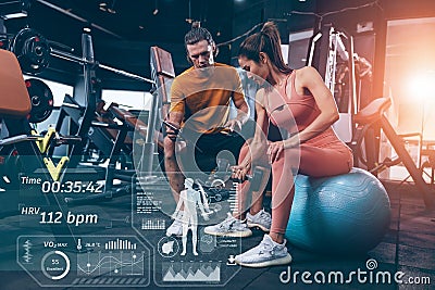 Modern technology in sport science concept. muscle strength training people in sport club overlay data chart body analysis diagram Stock Photo
