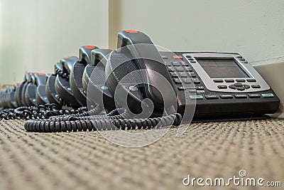 Modern Technology VoIP Telephones sit waiting their deployment Stock Photo