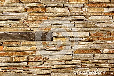 Modern Tiled Stonewall From Flagstone And Limestone Slabs, Background Texture Stock Photo