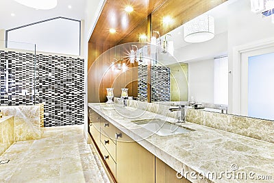 Modern tiled table in wash room with sink Stock Photo