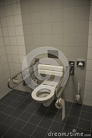 Modern toilet for disabled wheelchaired people in Germany, closeup, details Stock Photo