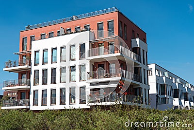 Modern townhouses under a blue sky Stock Photo