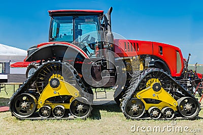 Modern tractor for agriculture on the farm with a powerful motor Stock Photo