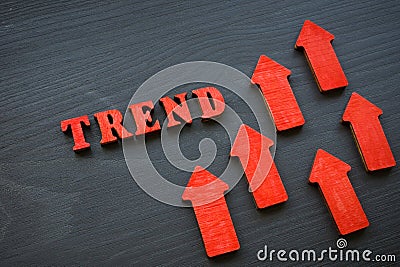 Modern trend word and red rising arrows. Stock Photo