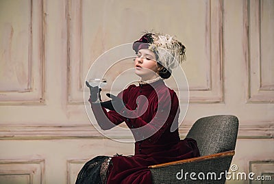 Modern trendy look of Portrait of an Unknown Woman. Retro style, comparison of eras concept. Stock Photo
