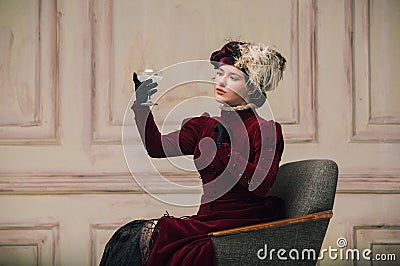 Modern trendy look of Portrait of an Unknown Woman. Retro style, comparison of eras concept. Stock Photo