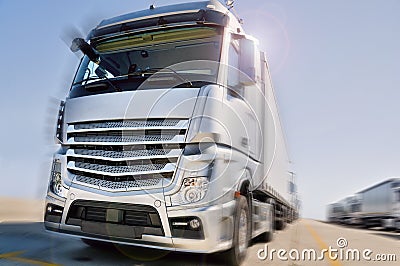 Modern Truck on road motion blur dramatic Stock Photo