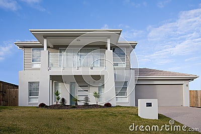 Modern two storey house with a balcony Stock Photo