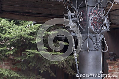 a modern version of the torch, made in the Gothic style. Light instead of fire Stock Photo