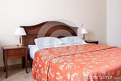 Modern, warm, inviting bedroom or hotel room Stock Photo